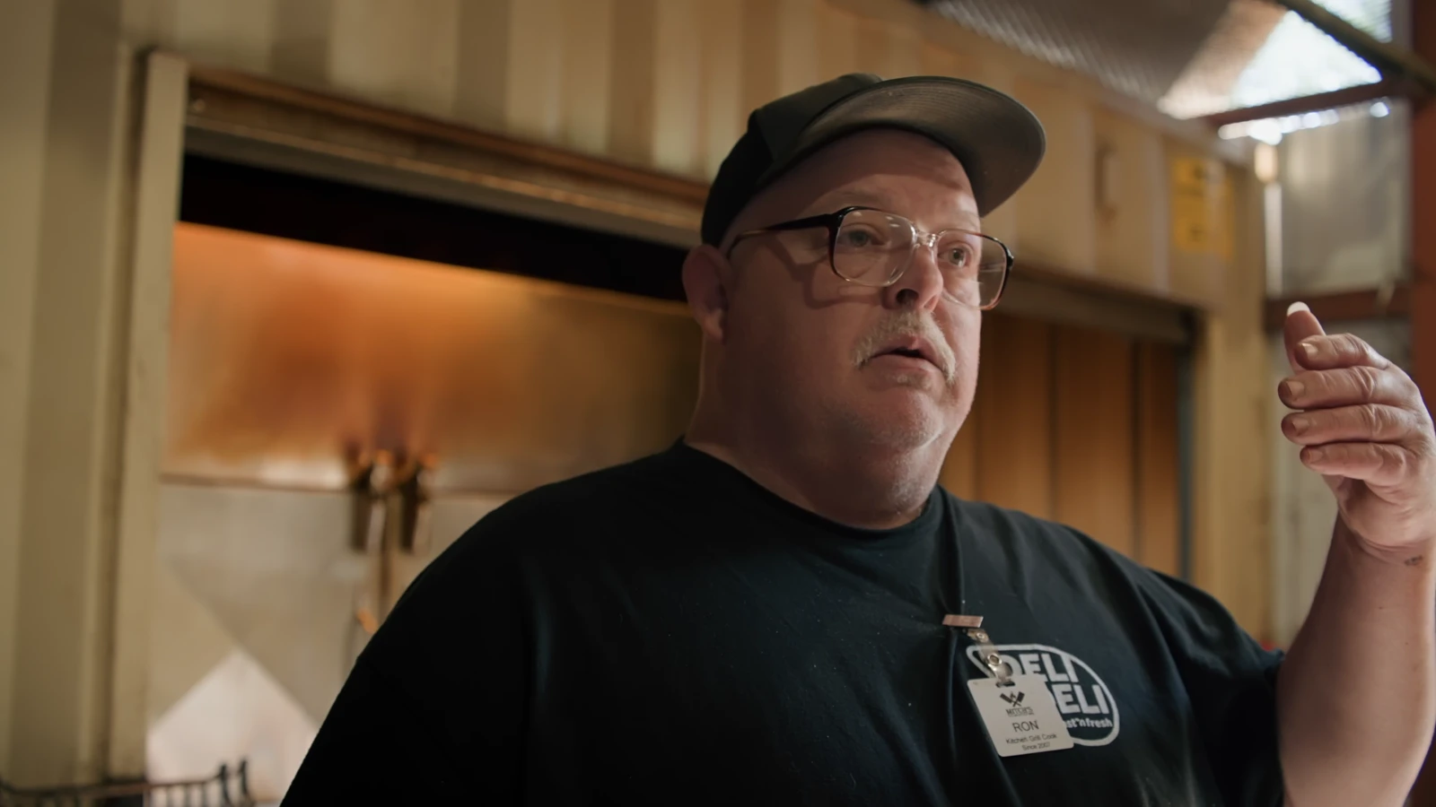 A frame from Ron | Pitmaster